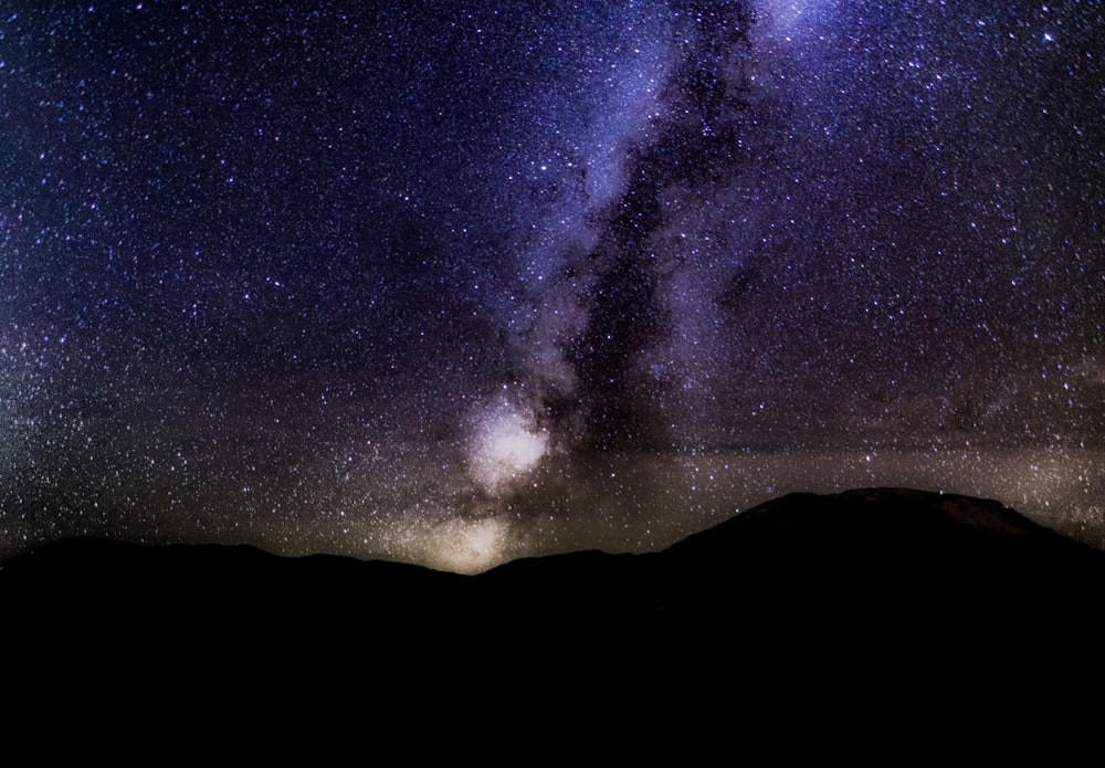 silhouette of mountain under sky