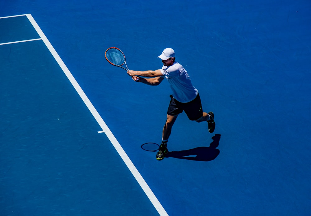 A man playing tennis in Australia