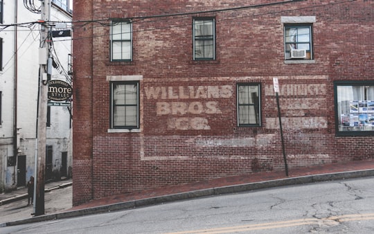 brown concrete building beside road in Portland United States