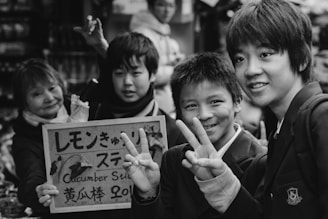 A diverse group of young people smiling together outdoors, symbolizing European mobility and volunteer spirit.