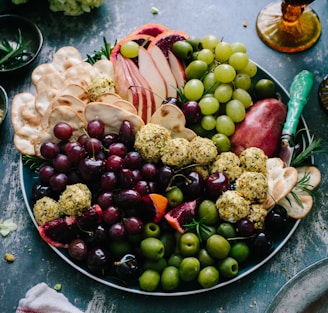 assorted fruits on silver round plate