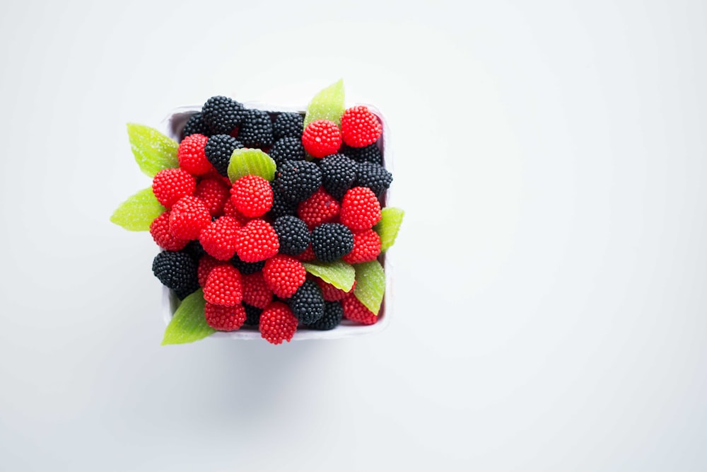 bowl of red and black berries