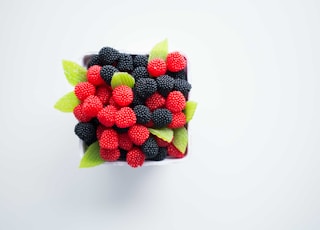 bowl of red and black berries