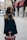 woman holding brown leather bag in bokeh photography