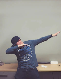 dubbing man in blue sweater