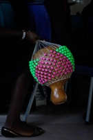 Portrait of a master musician from Montes de María holding a maraca.