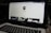 A laptop displaying a social media profile page with various elements such as a profile picture, username, and links. Below the main header, there are sections for photos and collections, showing preview images. The laptop keyboard is visible in the lower part of the image.