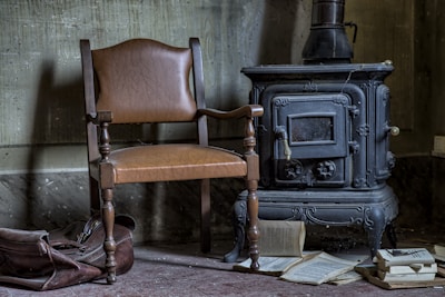 two black leather padded chairs