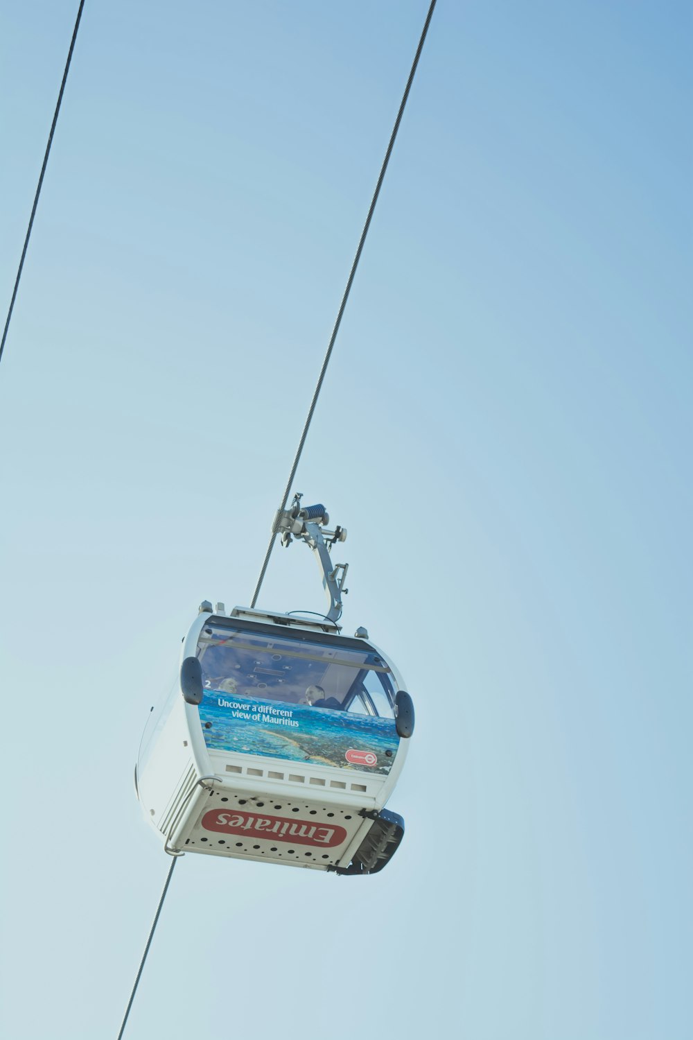 shallow focus photo of white cable car