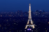 A stunning view of the Eiffel Tower illuminated at night.