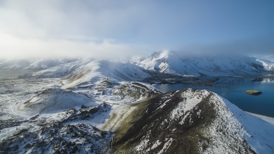 aerial view photography of snow mountain near lake in Southern Region Iceland