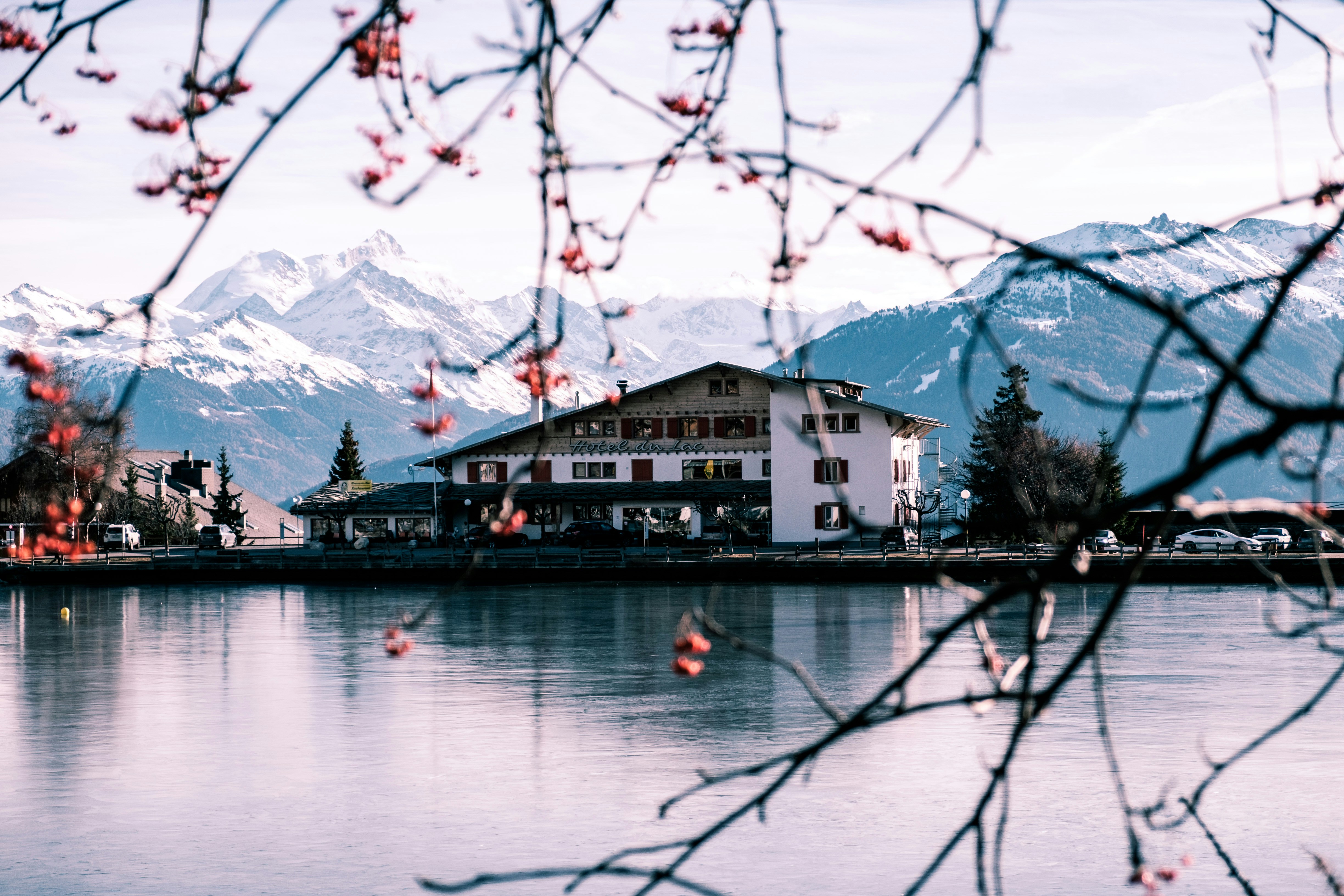 photography of house surrounded by lake during daytime