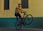 man riding bicycle doing tricks near building photography