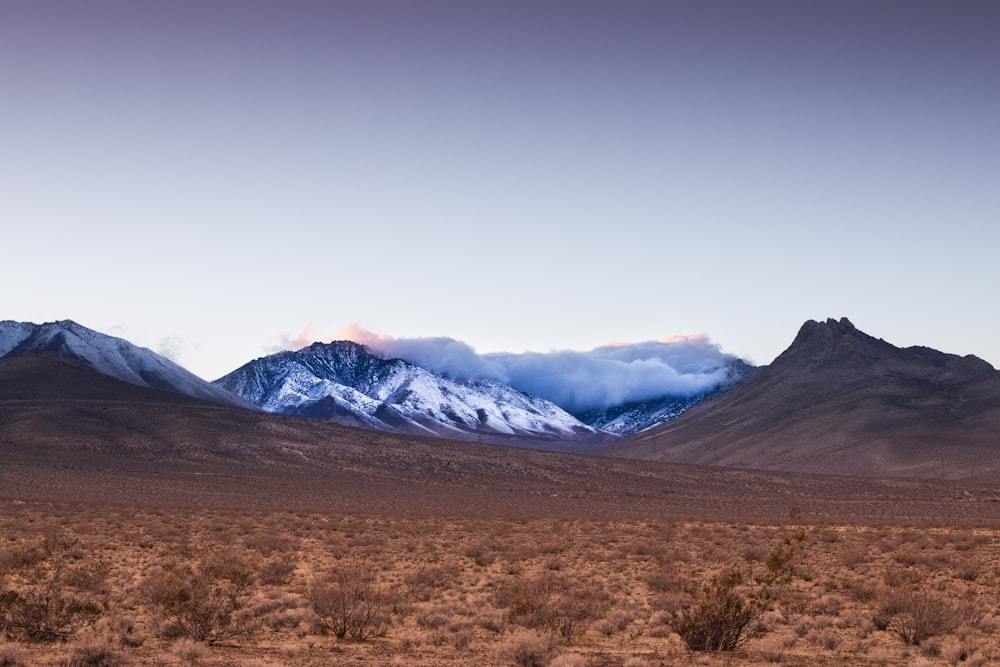 photo of a mountain with clouds