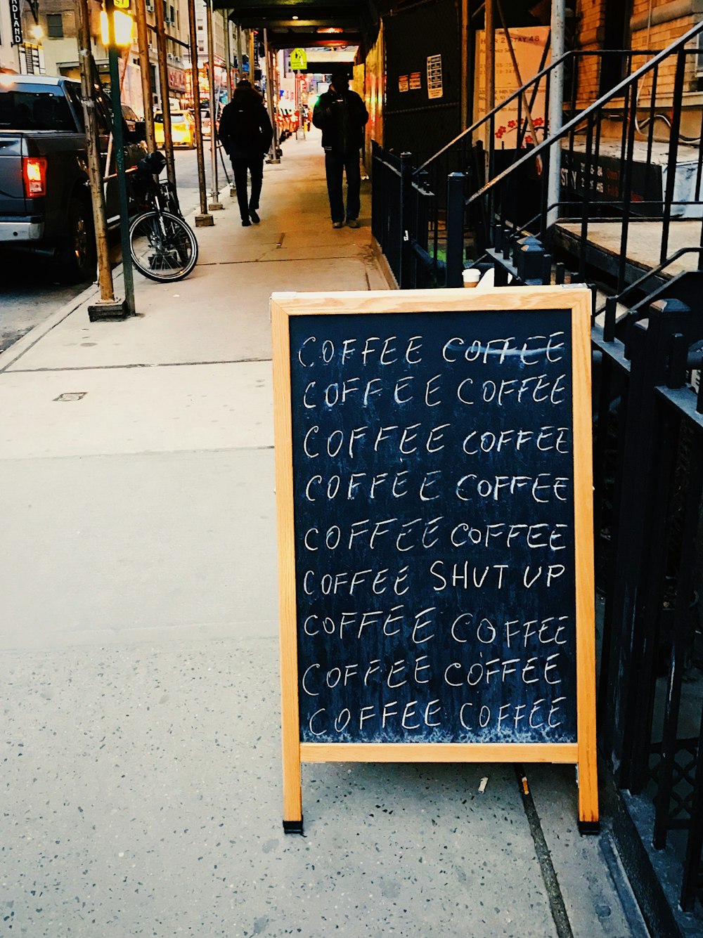 coffee signs near buildings