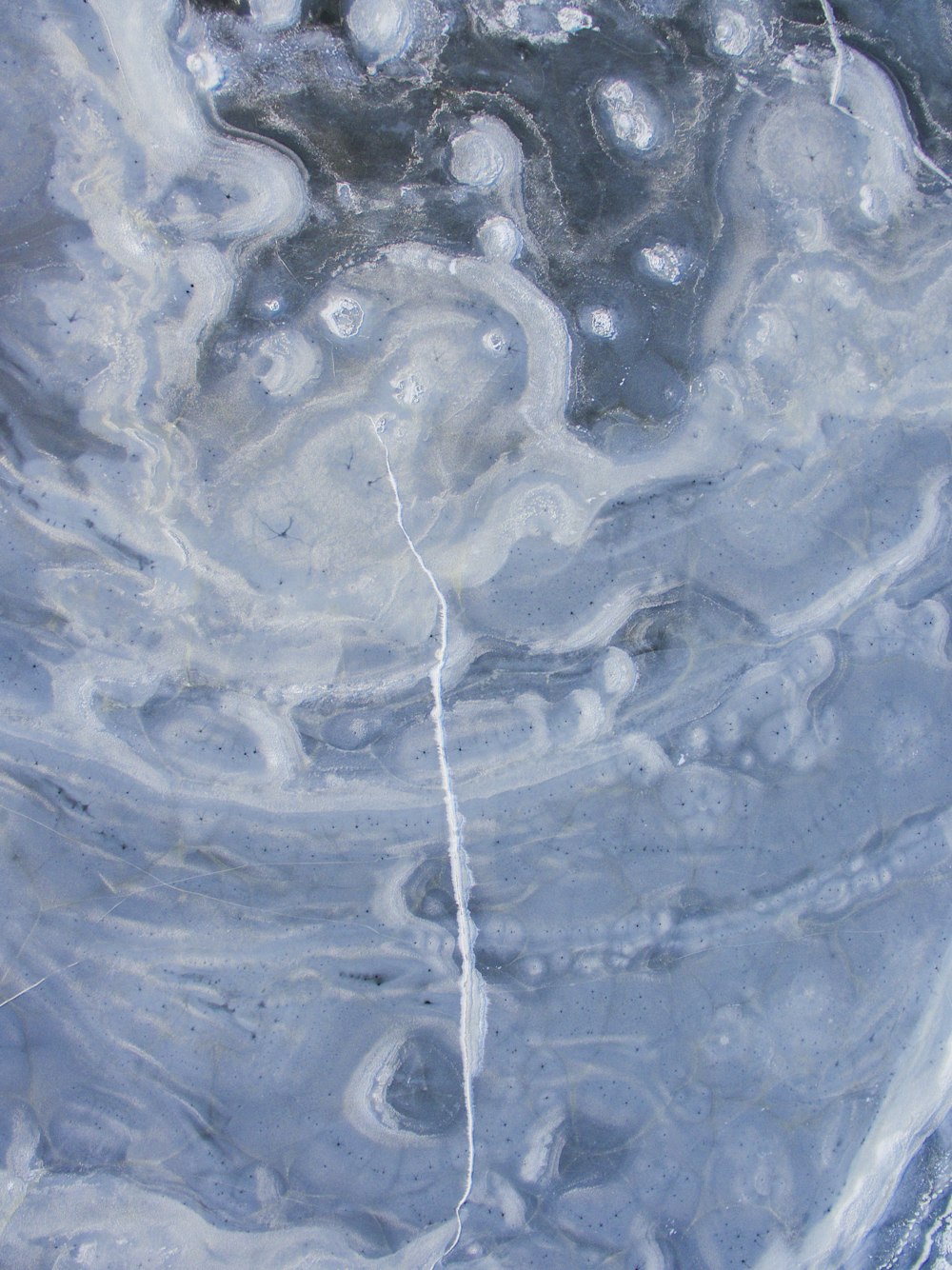 a close up of a painting of water