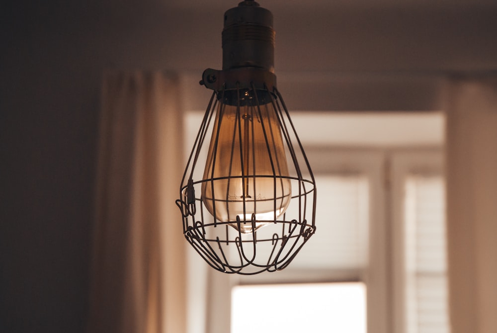 black pendant lamp in shallow focus