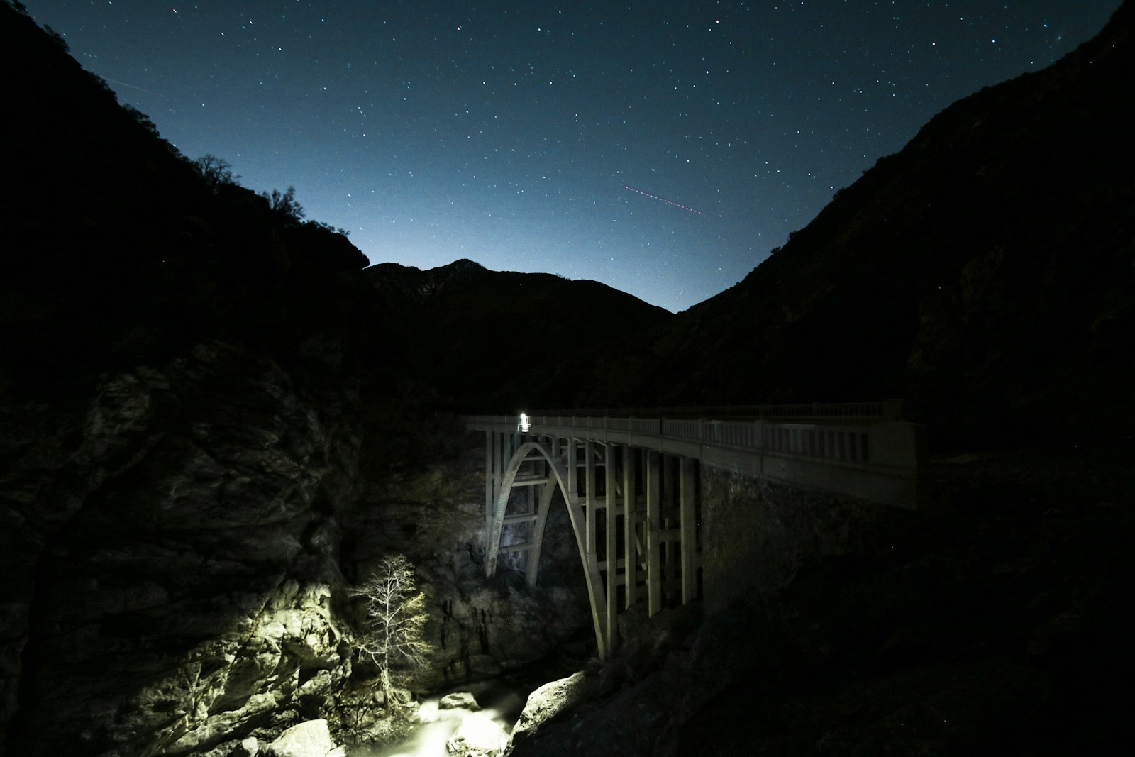 Canon EOS 7D Mark II + Canon EF-S 10-22mm F3.5-4.5 USM sample photo. Gray bridge under night photography