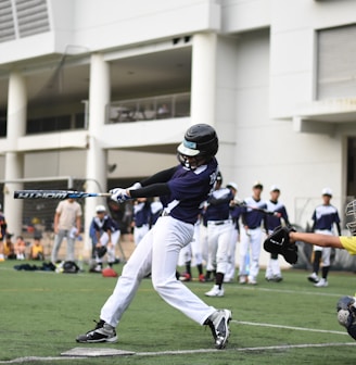 baseball players playing baseball on baseball field