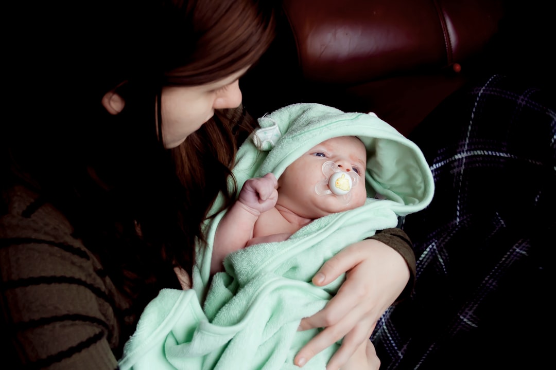 woman carrying baby, My Daughter and Wife, enjoying a moment post-bath time. These two are truly my better halves.
