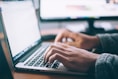 person using MacBook Pro