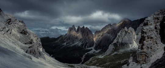 beige mountain under cloudy sky in Dolomites Italy