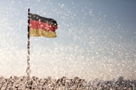 A vibrant photo of the Cameroon flag colors subtly integrated into a modern tech environment.