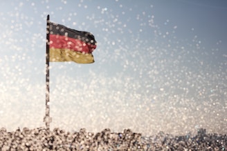 A vibrant photo of the Cameroon flag colors subtly integrated into a modern tech environment.