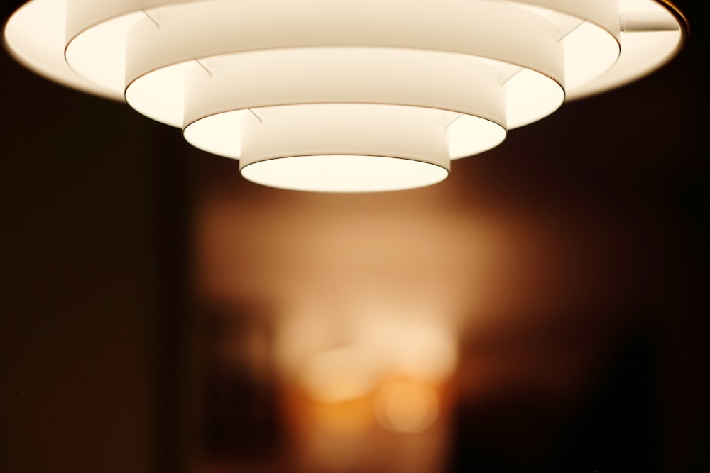 selective focus photo of white ceiling light