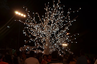 An artificial tree with lights enhancing a festive atmosphere.