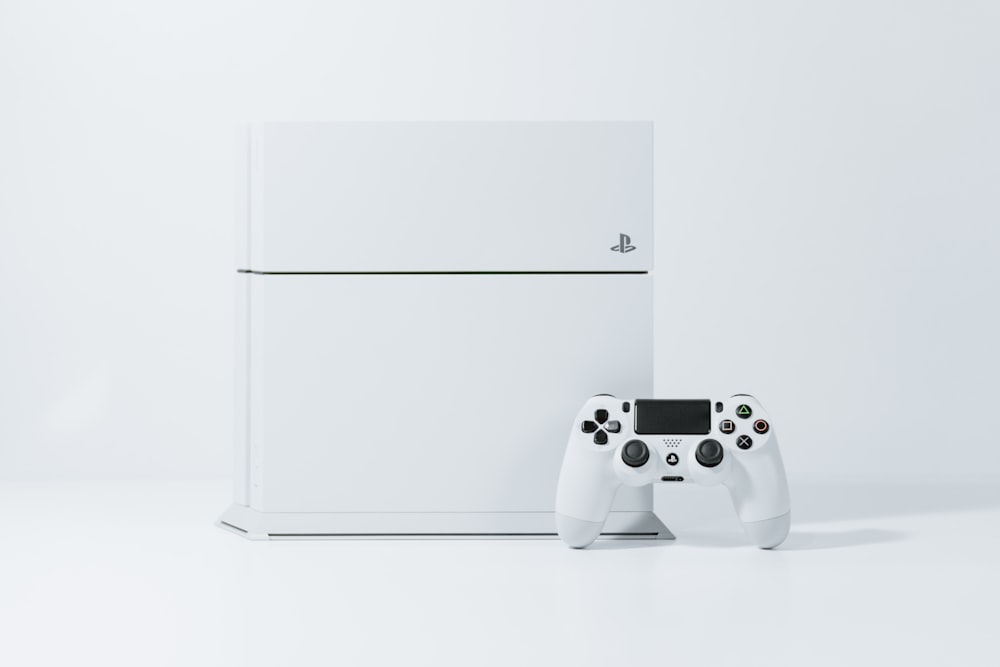 white Sony PS4 Original with controller