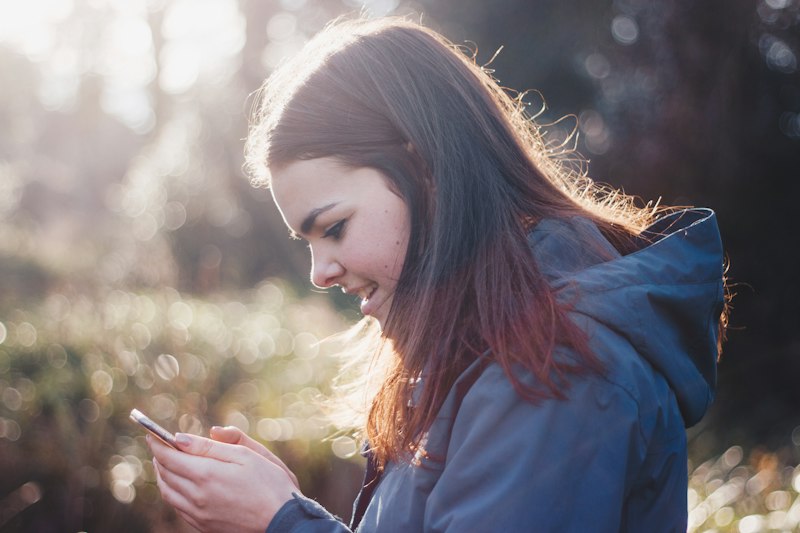 Parent checking phone
