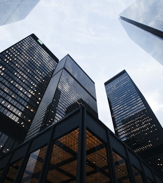 low angle photo of city high rise buildings during daytime