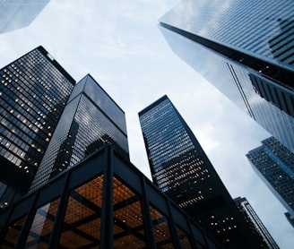 low angle photo of city high rise buildings during daytime