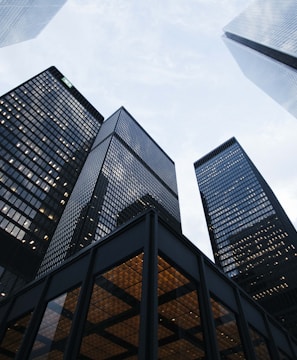 low angle photo of city high rise buildings during daytime