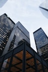 low angle photo of city high rise buildings during daytime