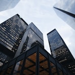 low angle photo of city high rise buildings during daytime