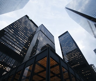 low angle photo of city high rise buildings during daytime