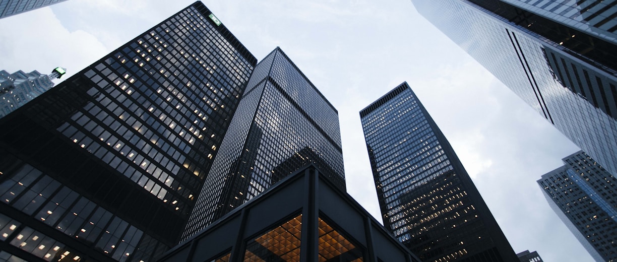 low angle photo of city high rise buildings during daytime