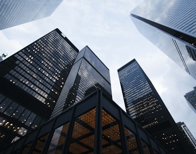 low angle photo of city high rise buildings during daytime