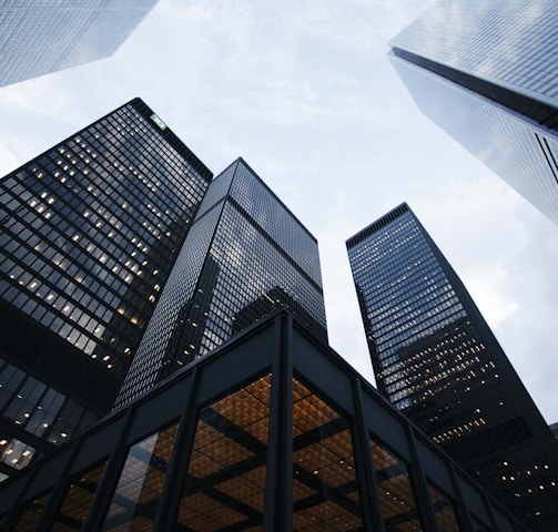 low angle photo of city high rise buildings during daytime