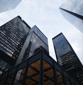 low angle photo of city high rise buildings during daytime