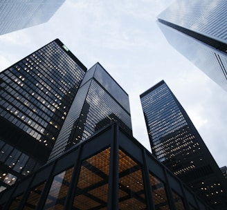 low angle photo of city high rise buildings during daytime