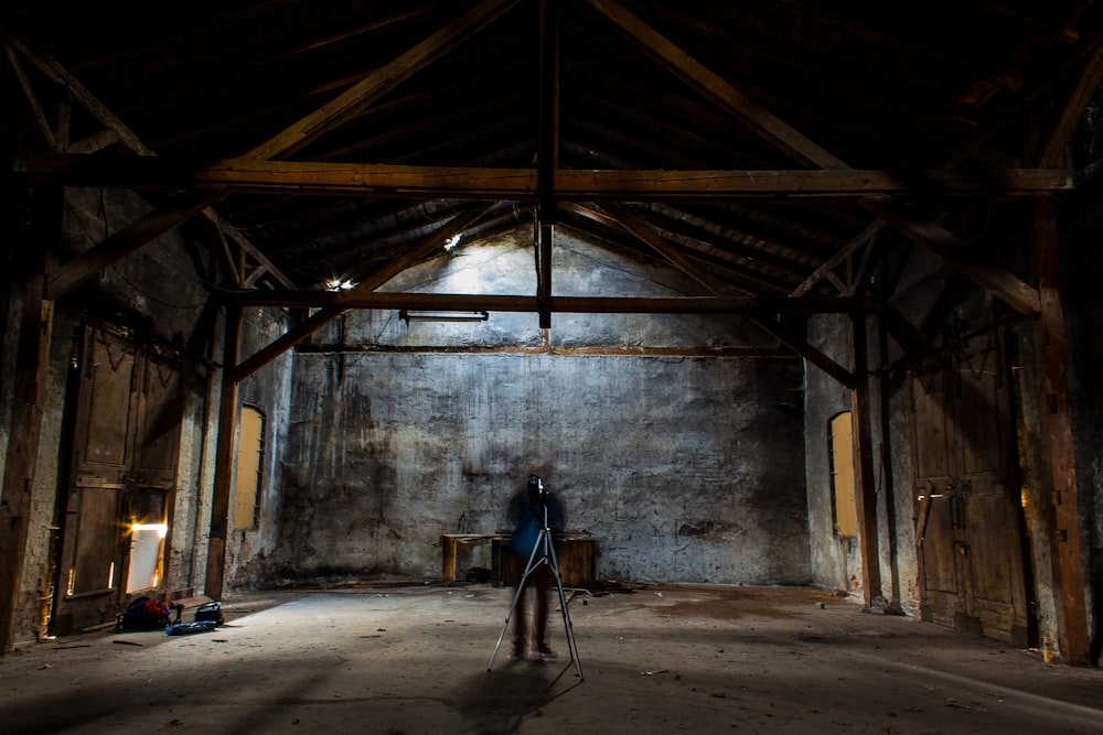 man standing inside building