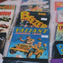 DVD case lot by Mitch Rosen (https://unsplash.com/@focusmitch)