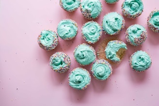 cupcake with teal icing lot