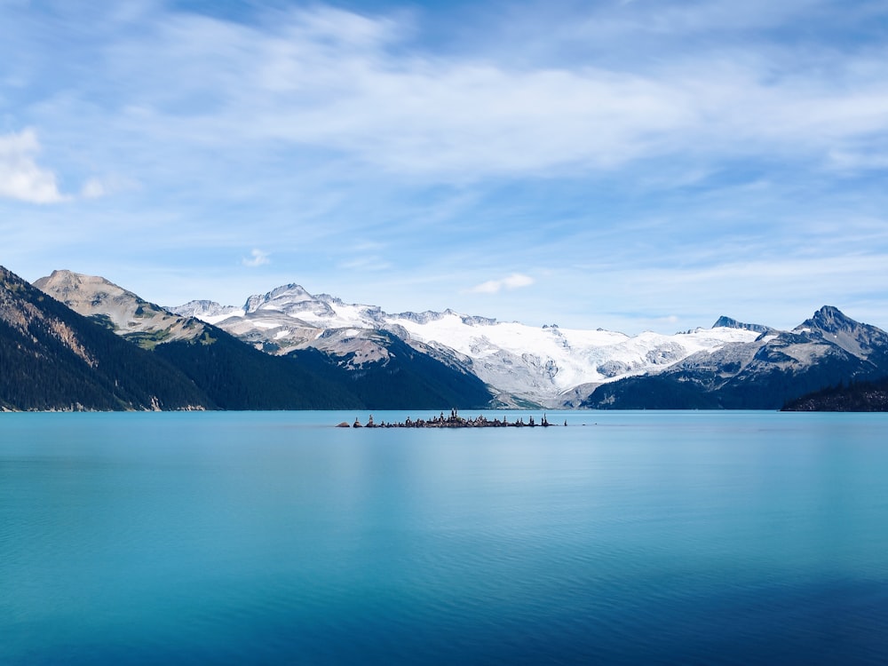 aerial view photography of mountain and body of water