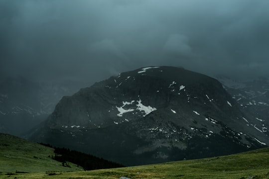 photography of mountain range during daytime in Rocky Mountain National Park United States