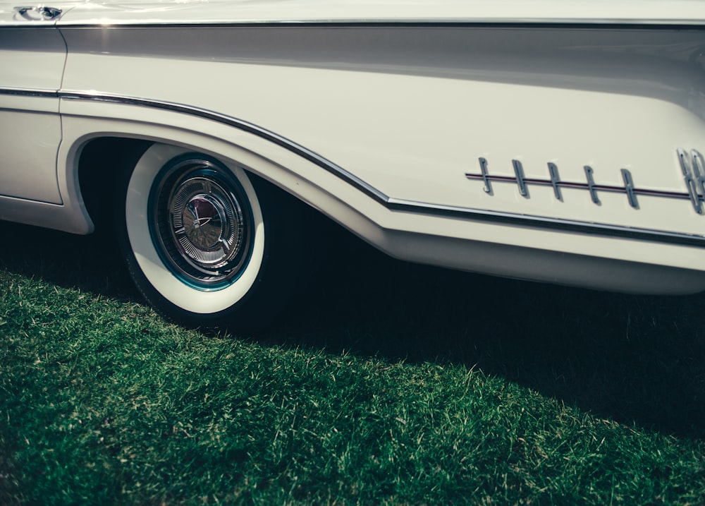 close-up photo of chrome wheel with tire