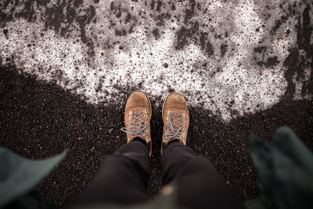 pair of brown leather low-top shoe